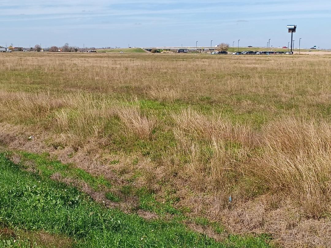 0 West Henderson Road Angleton, TX 77515 - Photo 3 of 5 a view of an ocean with city view