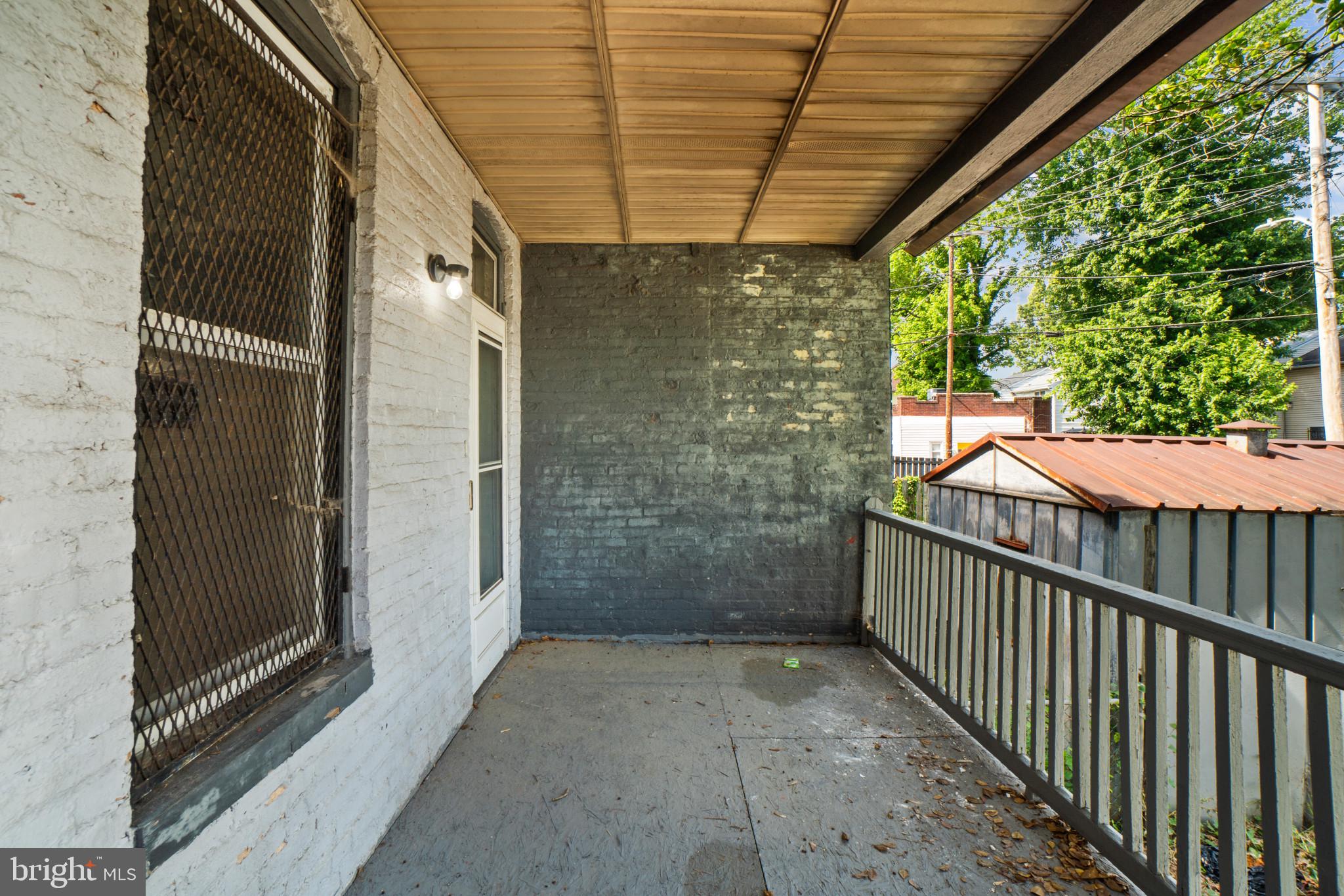 2159 Chelsea Terrace Baltimore, MD 21216 - Photo 27 of 30 Covered Porch