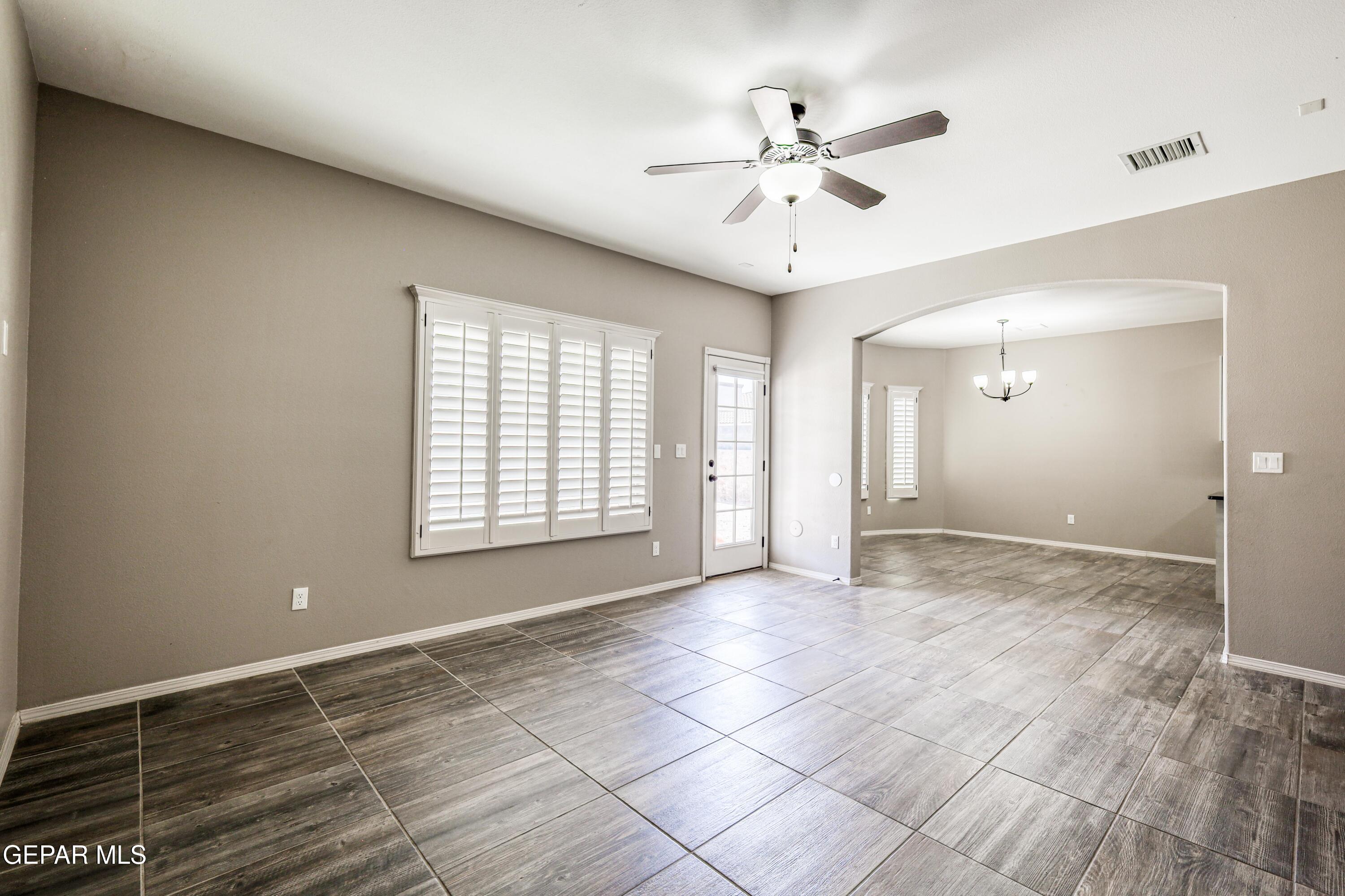 964 Penrith Street El Paso, TX 79928 - Photo 20 of 62 a view of an empty room with a window