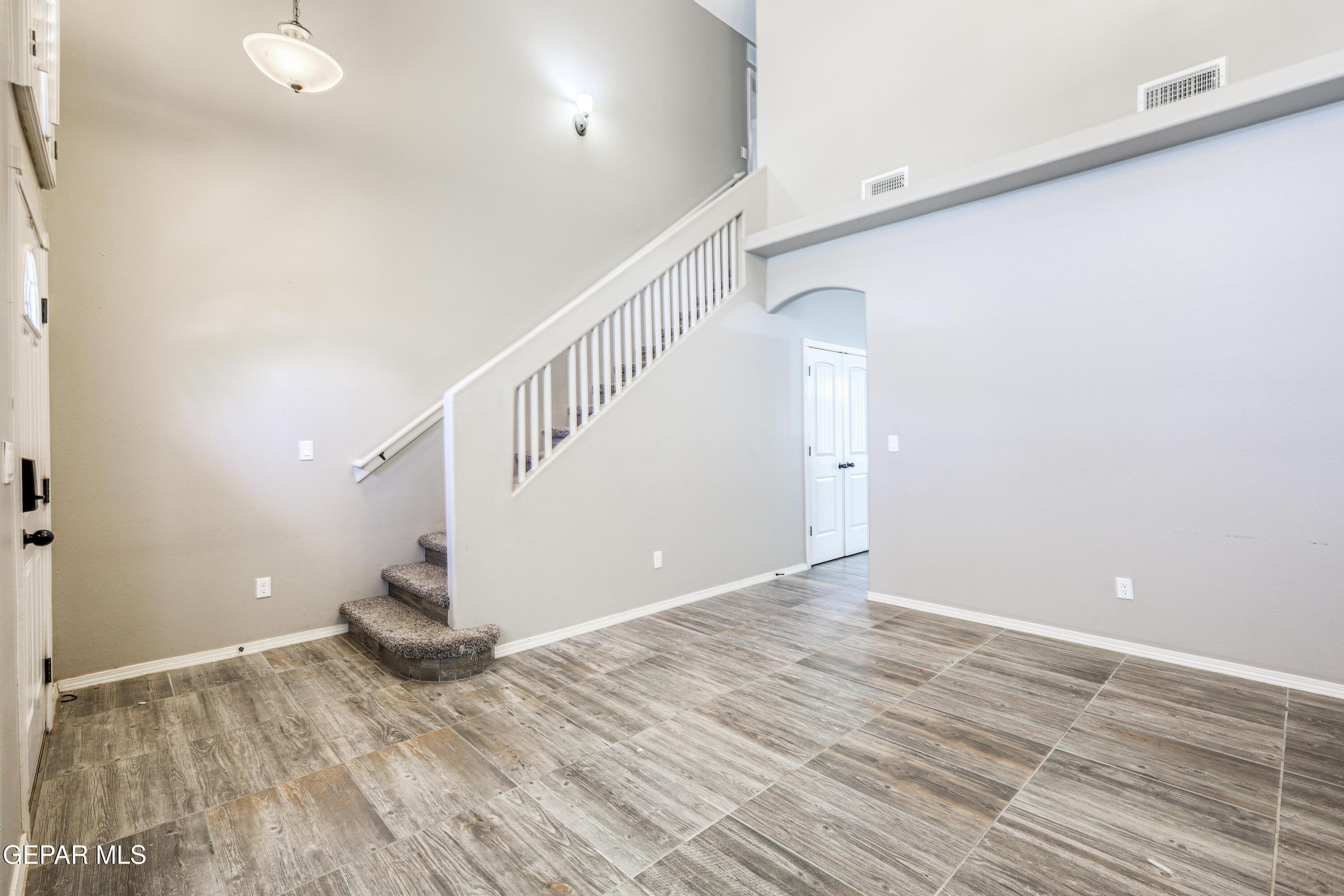 964 Penrith Street El Paso, TX 79928 - Photo 30 of 62 a view of entryway and hall with wooden floor