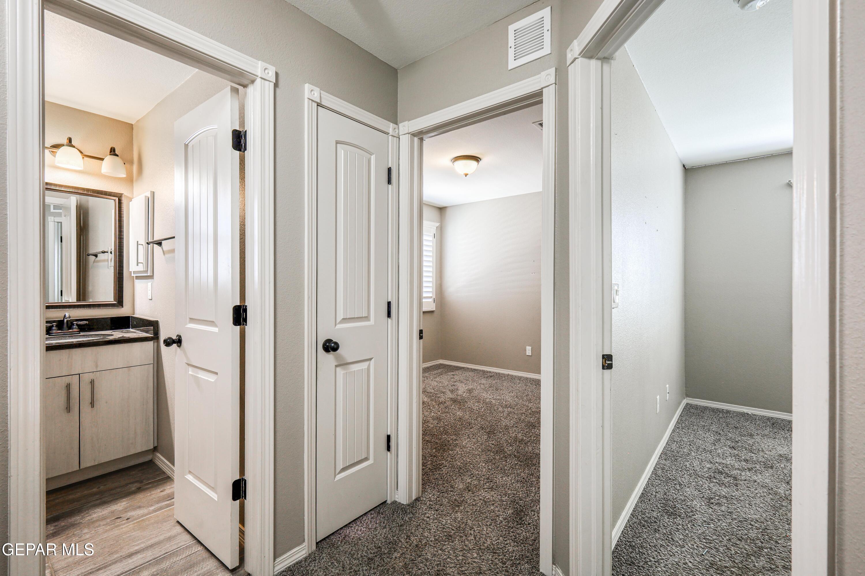964 Penrith Street El Paso, TX 79928 - Photo 52 of 62 a view of a bathroom from the hallway