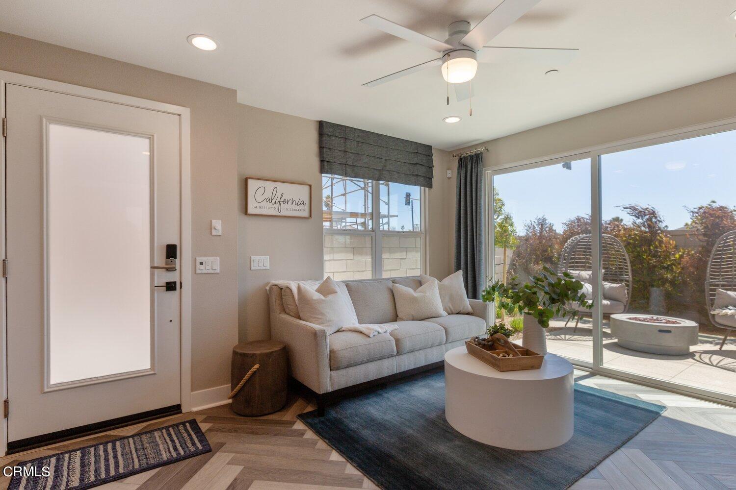 1030 Harbor Boulevard Oxnard, CA 93035 - Photo 20 of 24 a living room with furniture and a large window