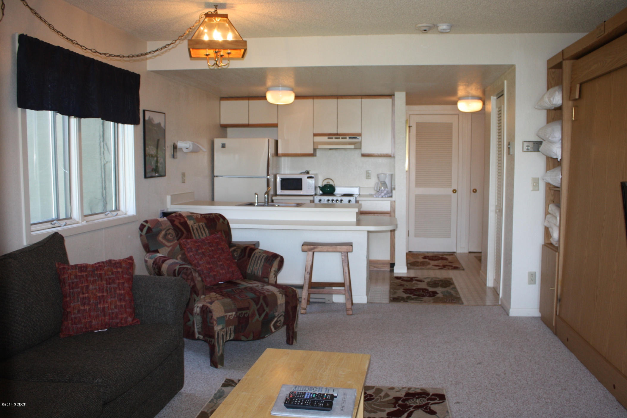 247 Co Road Granby, CO 80446 - Photo 4 of 15 living area towards kitchen