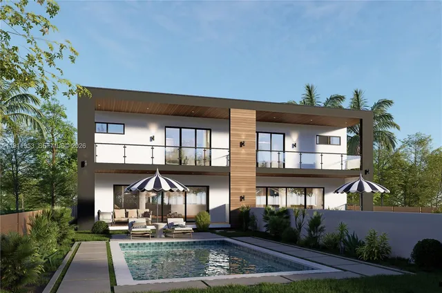 a front view of building with yard