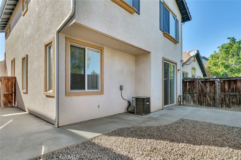 4543 Riverscape Drive Riverside, CA 92505 - Photo 22 of 25 a view of a house with wooden fence