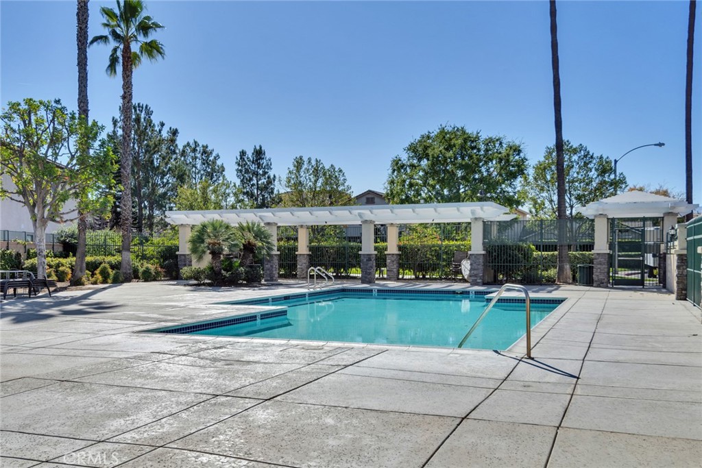 4543 Riverscape Drive Riverside, CA 92505 - Photo 25 of 25 a view of a house with garden and a porch