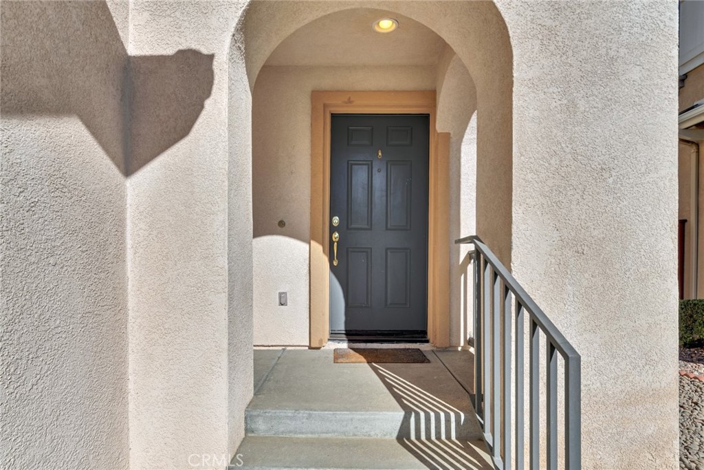 4543 Riverscape Drive Riverside, CA 92505 - Photo 4 of 25 a view of a hallway with wooden floor and staircase