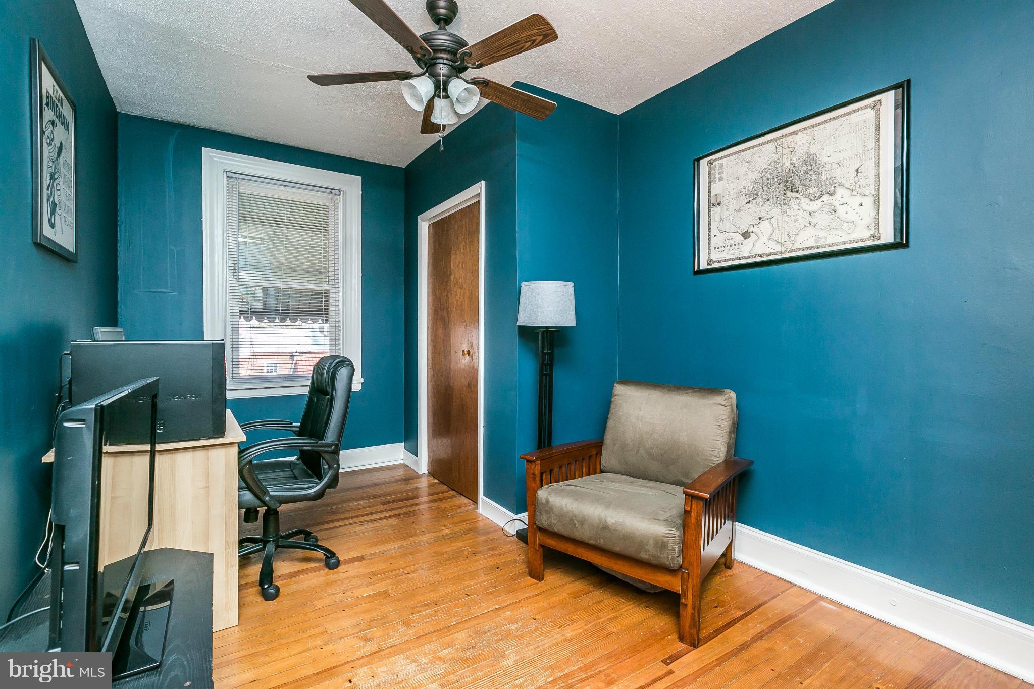 3609 Yolando Road Baltimore, MD 21218 - Photo 17 of 27 a work room with furniture and a window