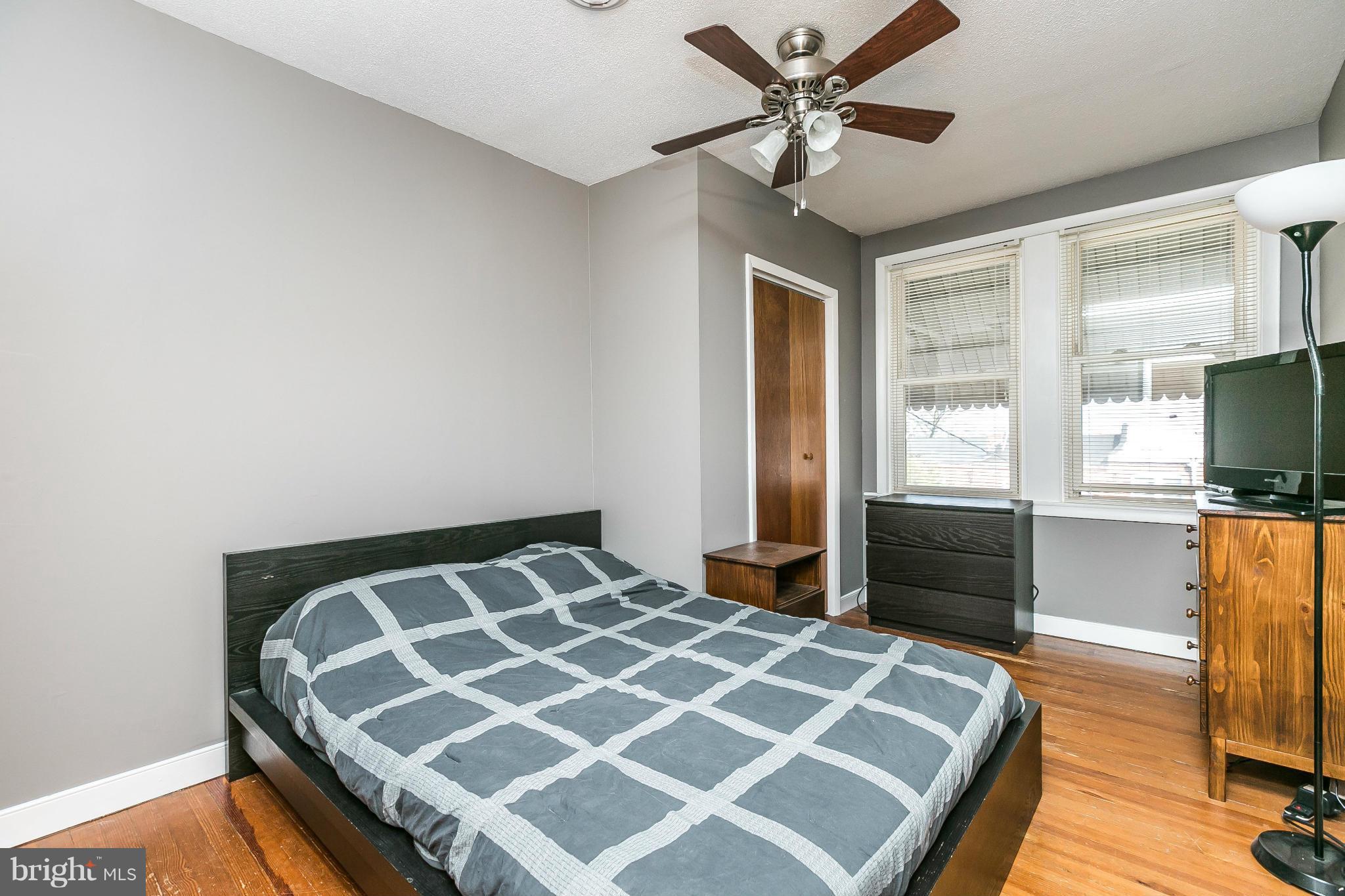 3609 Yolando Road Baltimore, MD 21218 - Photo 19 of 27 a bedroom with a bed and a flat screen tv
