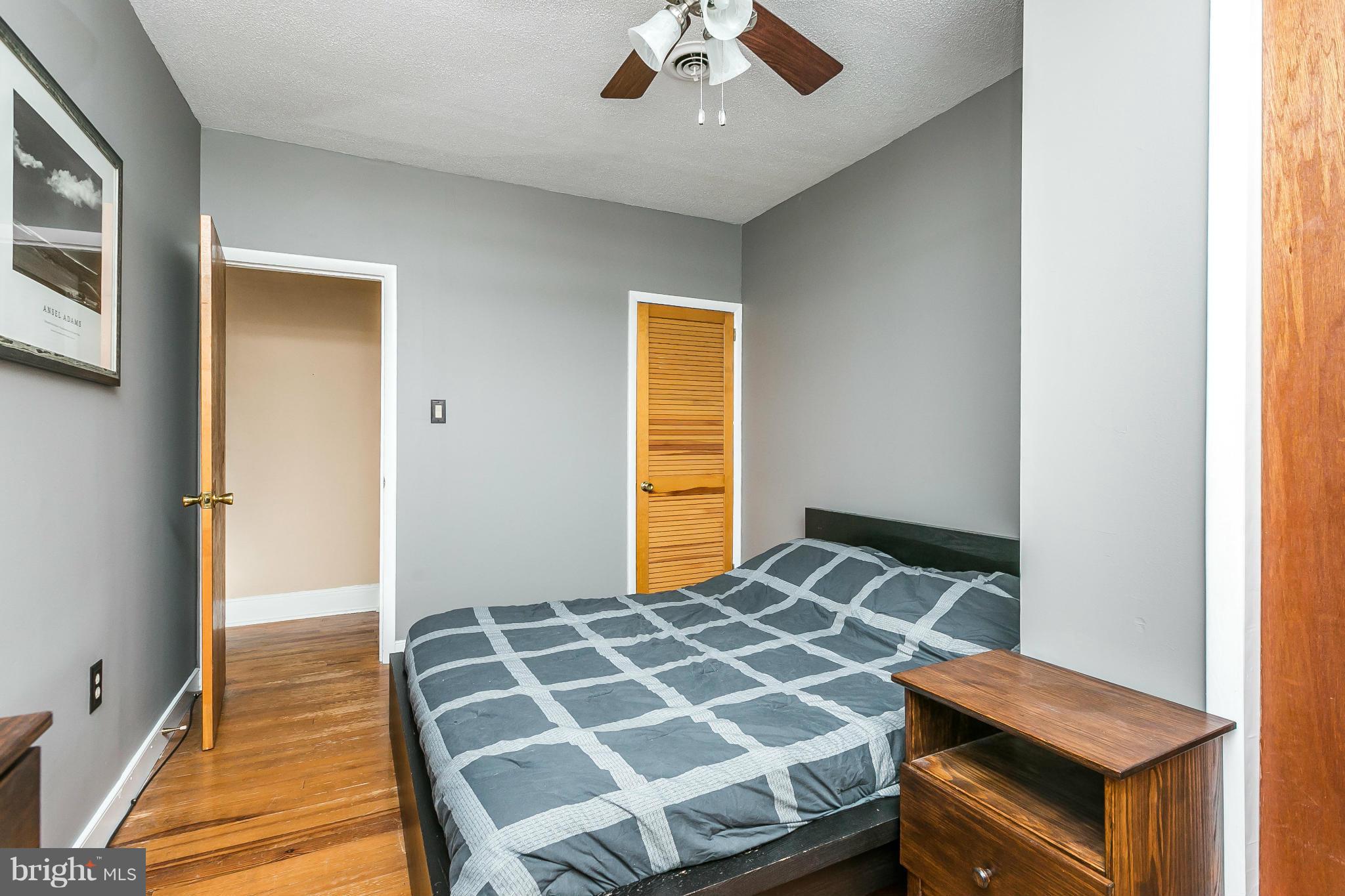 3609 Yolando Road Baltimore, MD 21218 - Photo 21 of 27 a bedroom with a bed and a window