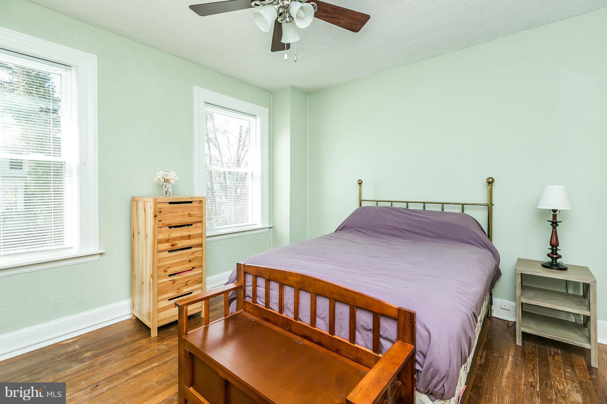 3609 Yolando Road Baltimore, MD 21218 - Photo 24 of 27 a bedroom with furniture and wooden floor