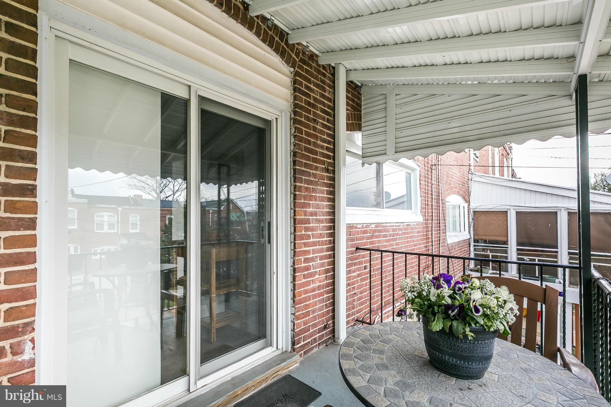 3609 Yolando Road Baltimore, MD 21218 - Photo 27 of 27 a view of a balcony with a potted plant