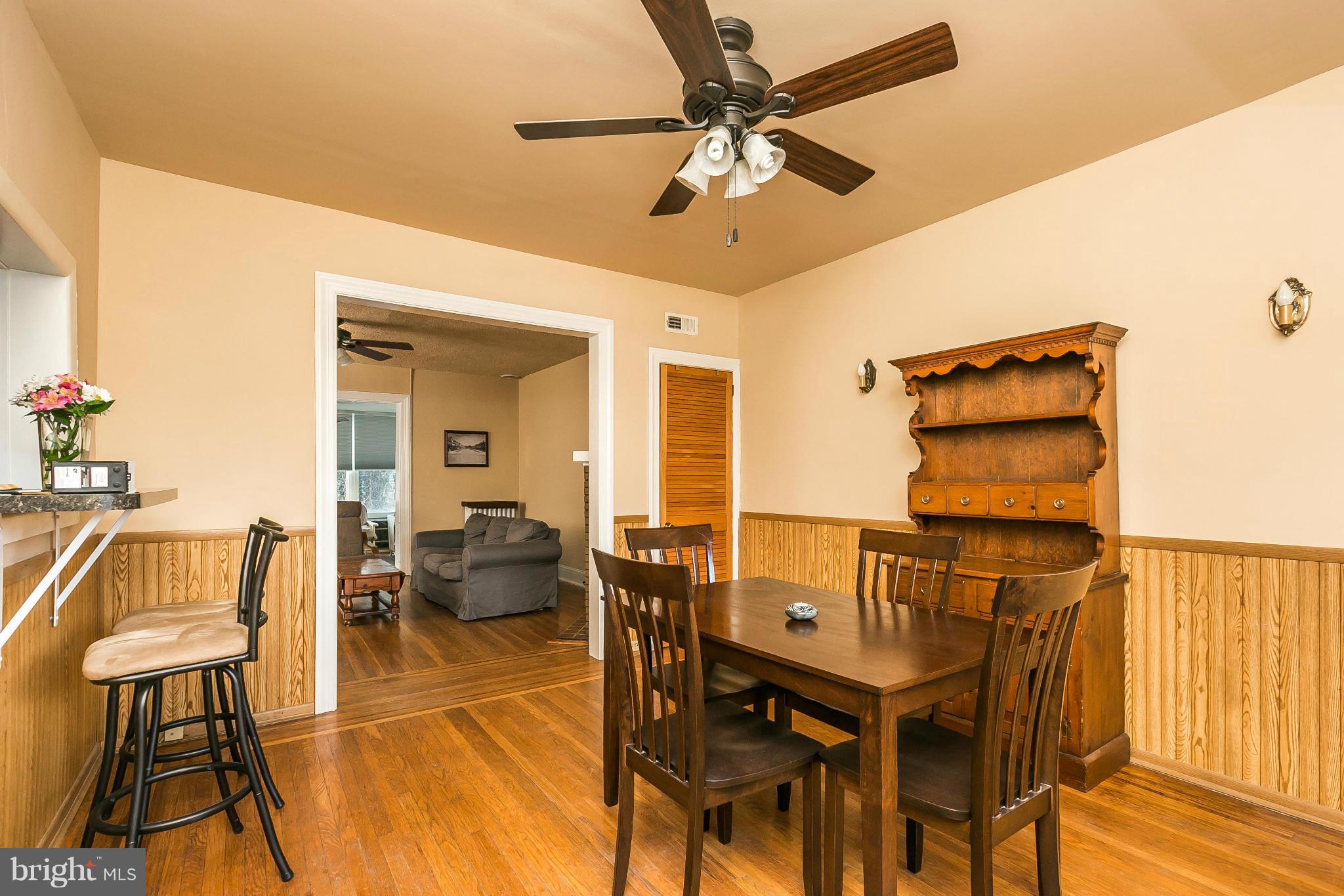 3609 Yolando Road Baltimore, MD 21218 - Photo 9 of 27 a view of a dining room with furniture and wooden floor
