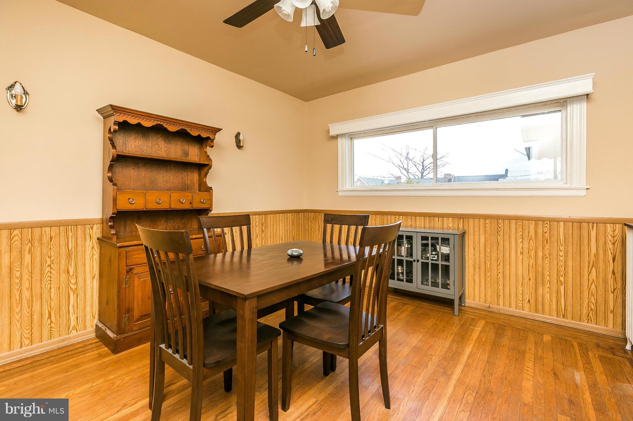 3609 Yolando Road Baltimore, MD 21218 - Photo 10 of 27 a view of a dining room with furniture and chandelier