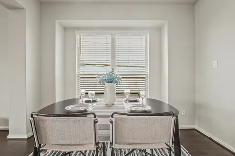 a table and chairs in a room