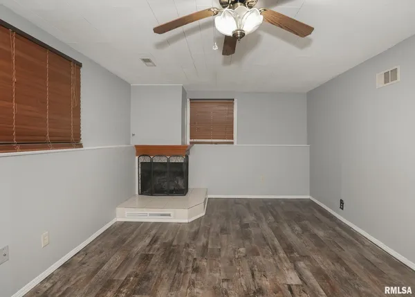 a view of small space with wooden floor