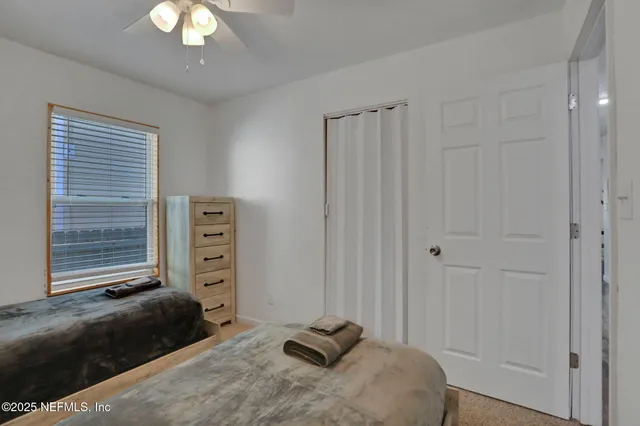 a bathroom with a sink a mirror and a toilet