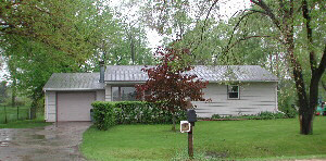 13696 Dorr Road Rockton, IL 61072 - Photo 1 of 1 a front view of a house with garden