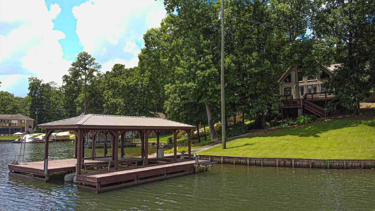 197 Airstrip Road Jackson, GA 30233 - Photo 1 of 1 a view of a swimming pool with a patio