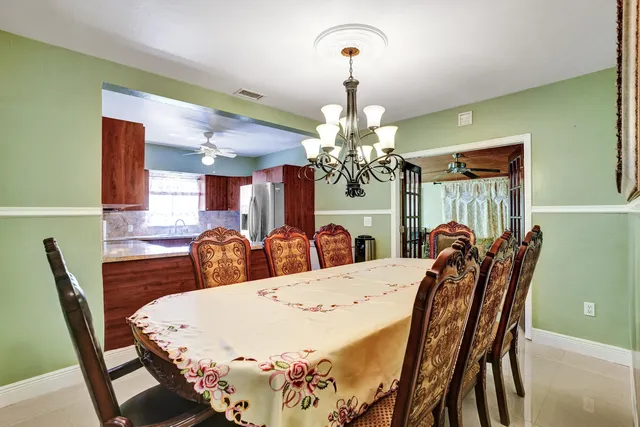 a view of a dining room with furniture