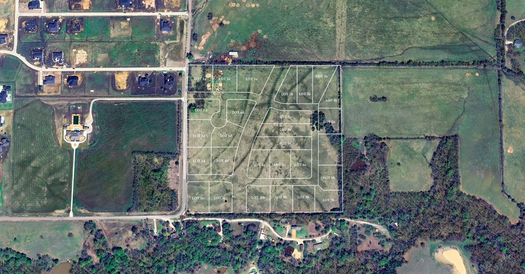 Tbd Iris Road Celina, TX 75009 - Photo 2 of 2 an aerial view of a house with a yard