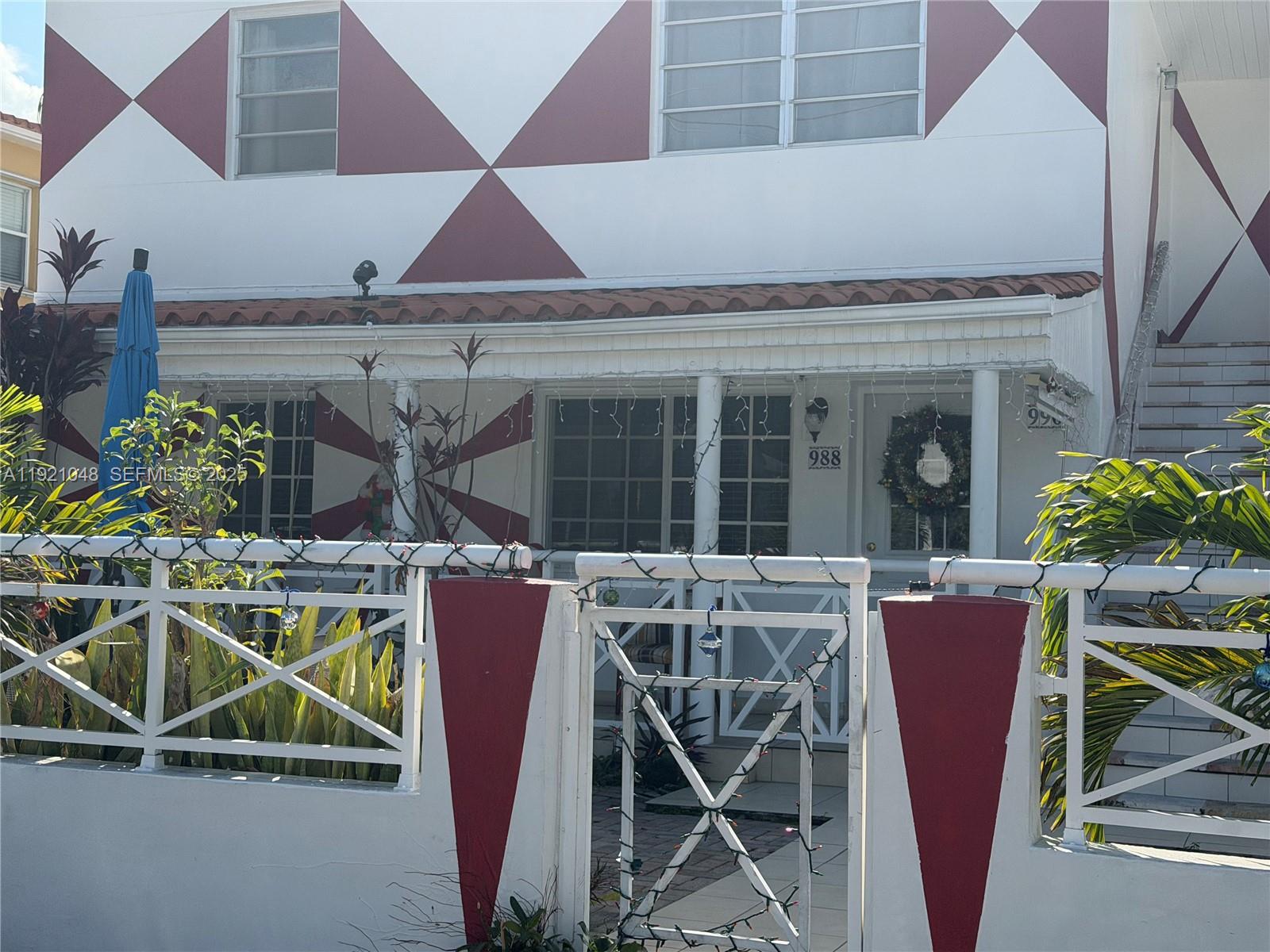 a view of a chairs and table in the patio