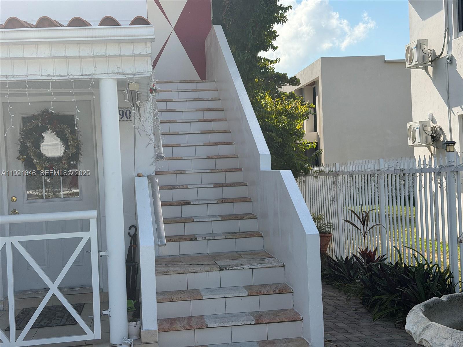 990 Southwest 9th Street Miami, FL 33130 - Photo 2 of 15 a view of entryway and hall with wooden floor