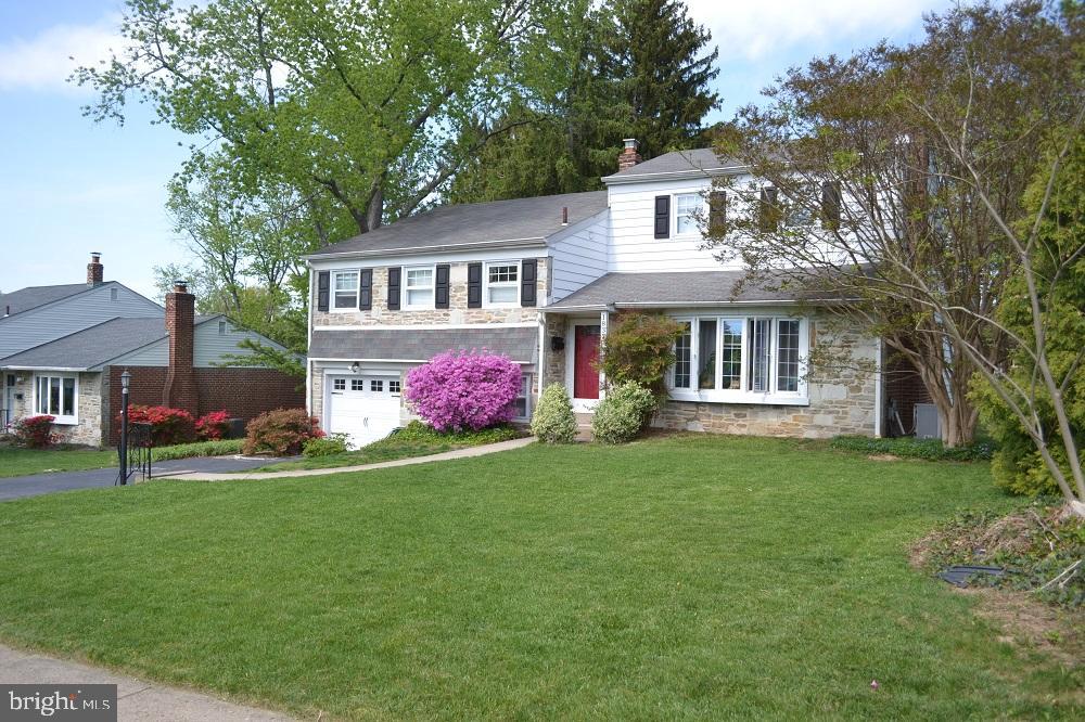 1837 Watson Road Abington, PA 19001 - Photo 1 of 33 a front view of a house with a garden