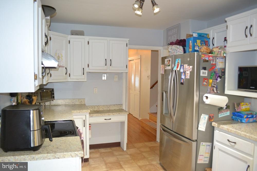 1837 Watson Road Abington, PA 19001 - Photo 11 of 33 a kitchen with stainless steel appliances granite countertop a refrigerator and a sink