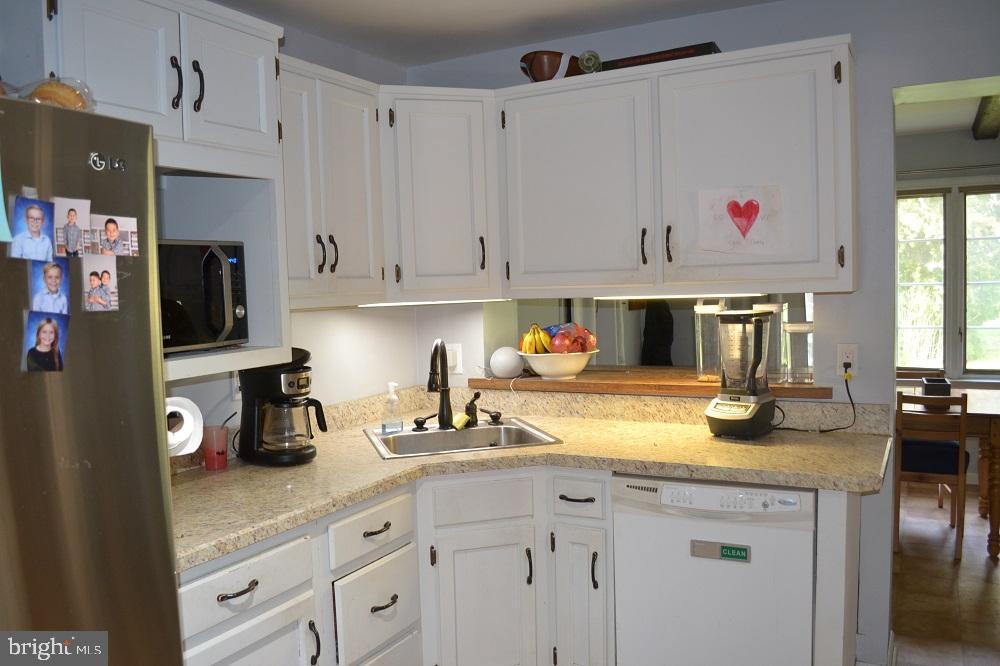 1837 Watson Road Abington, PA 19001 - Photo 12 of 33 a kitchen with cabinets appliances and a counter top space