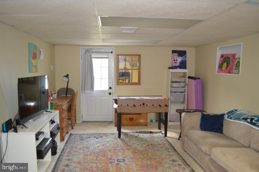 1837 Watson Road Abington, PA 19001 - Photo 18 of 33 a living room with furniture and a flat screen tv
