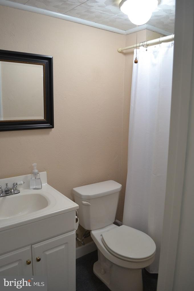 1837 Watson Road Abington, PA 19001 - Photo 20 of 33 a white toilet sitting next to a bathroom sink