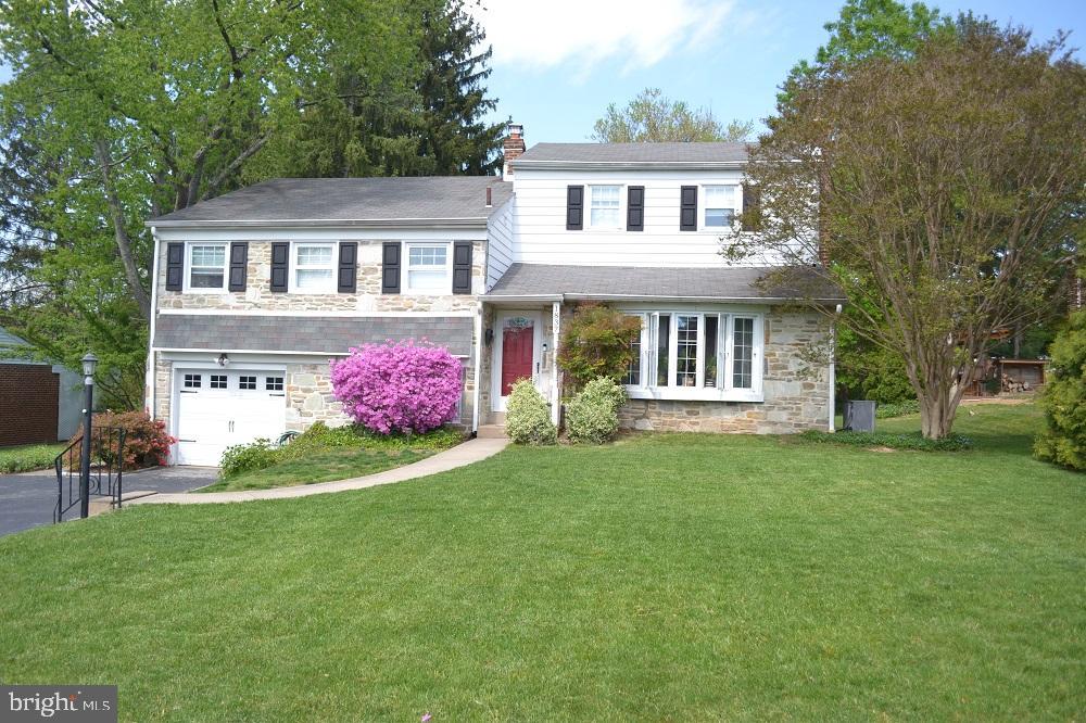 1837 Watson Road Abington, PA 19001 - Photo 2 of 33 a front view of a house with a garden