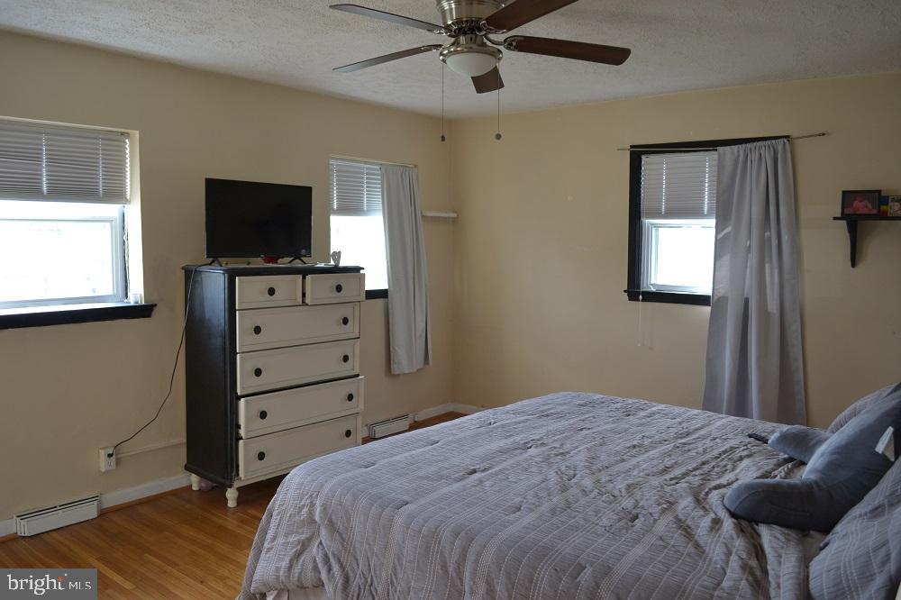 1837 Watson Road Abington, PA 19001 - Photo 21 of 33 a bedroom with a bed and a flat screen tv