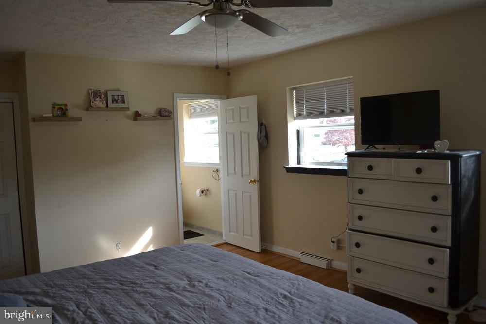1837 Watson Road Abington, PA 19001 - Photo 22 of 33 a bedroom with a bed and a flat screen tv