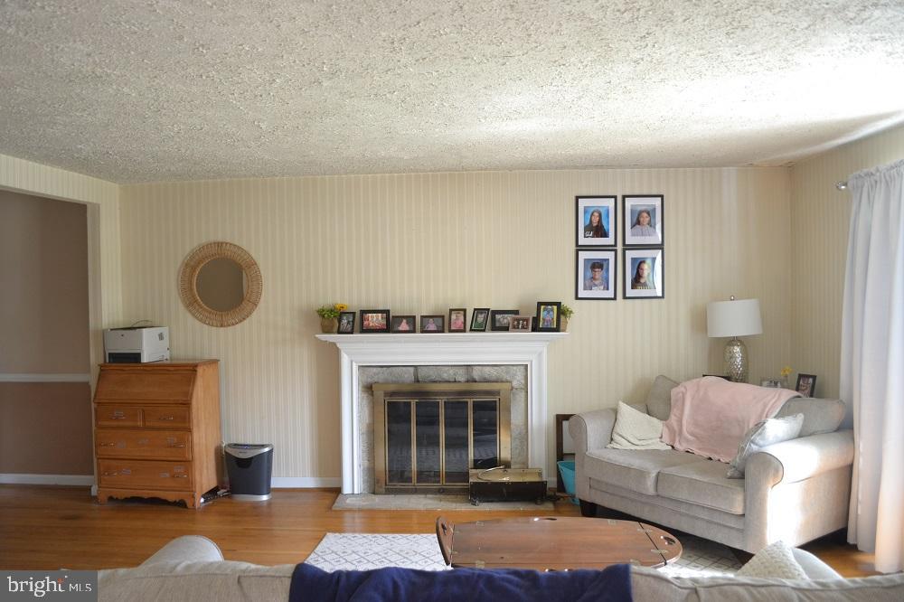 1837 Watson Road Abington, PA 19001 - Photo 5 of 33 a living room with furniture and a fireplace
