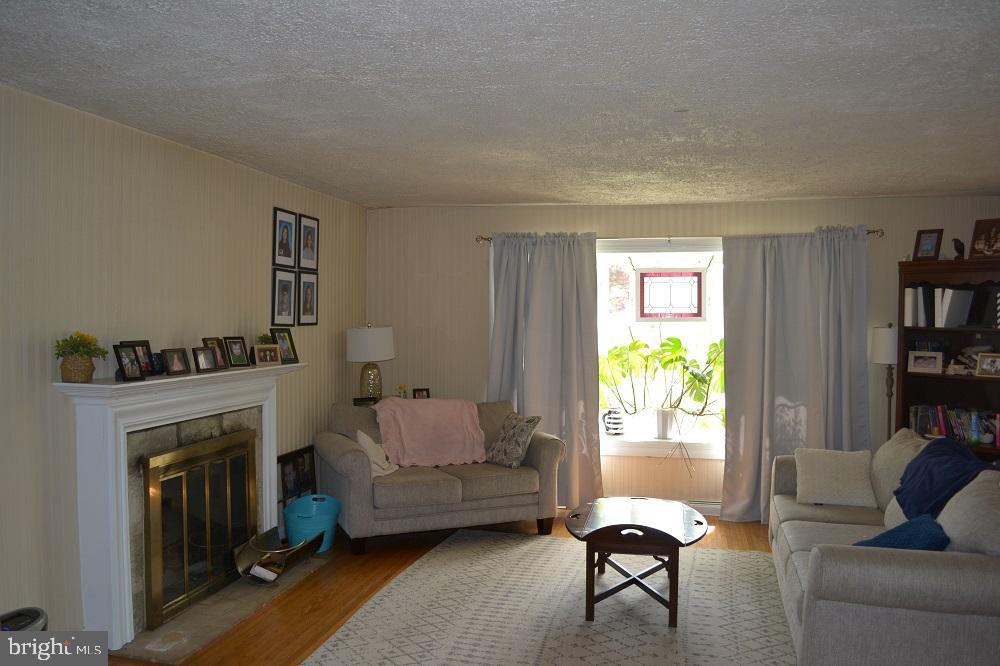 1837 Watson Road Abington, PA 19001 - Photo 6 of 33 a living room with furniture and a fireplace