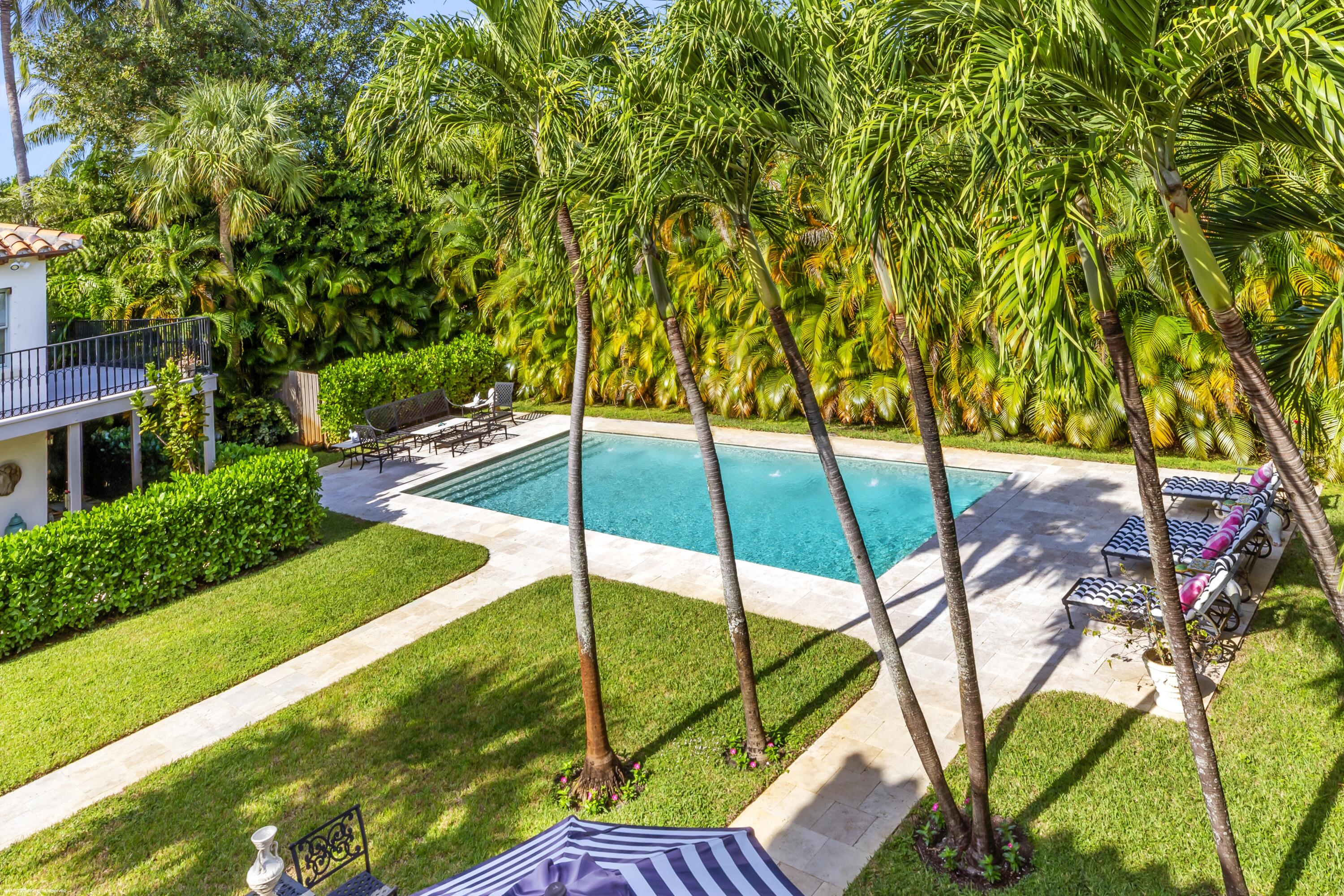 245 Valencia Road West Palm Beach, FL 33401 - Photo 27 of 39 a view of an outdoor space with seating