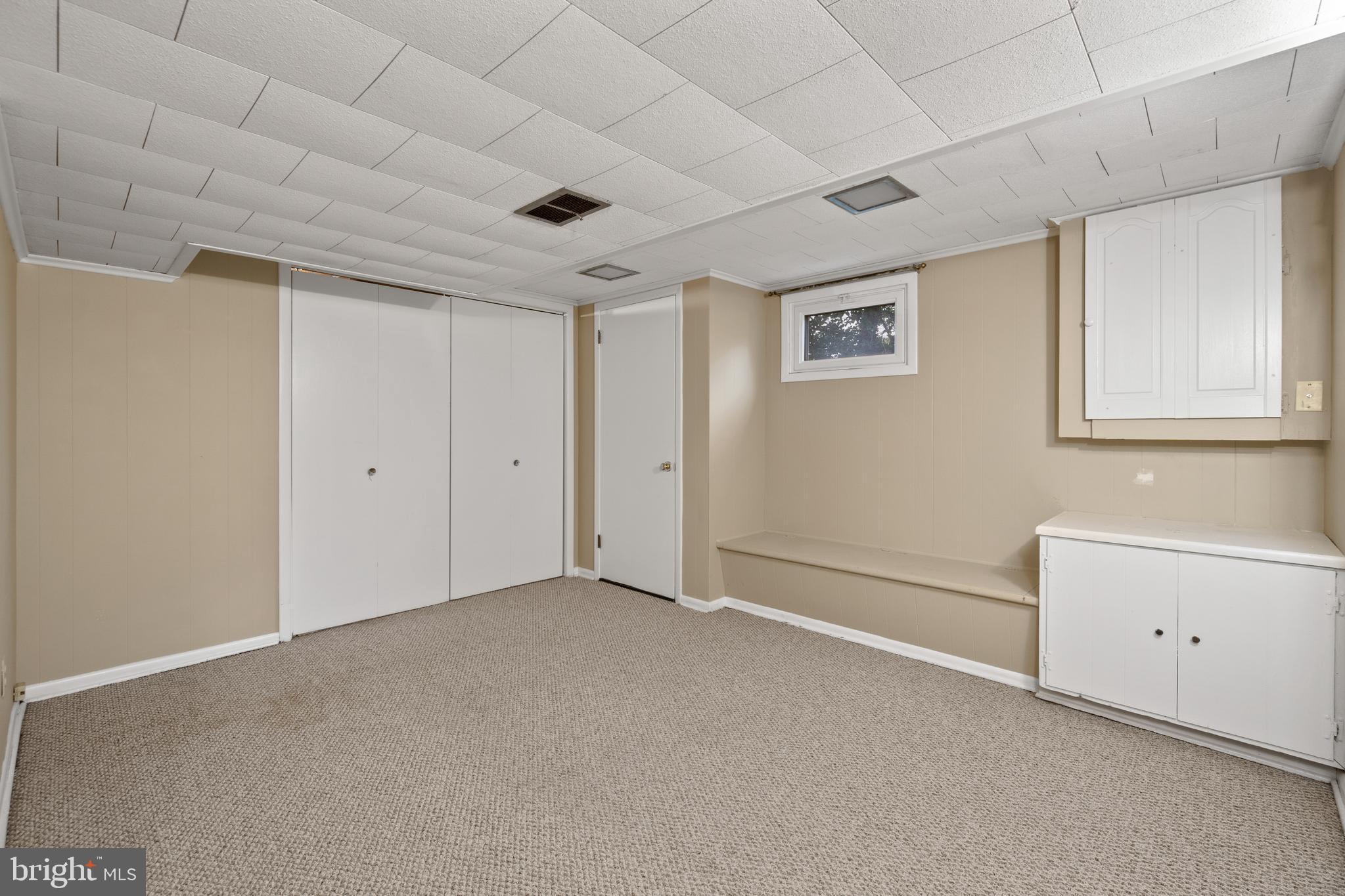 315 Waterford Road Silver Spring, MD 20901 - Photo 22 of 23 Basement hang-out room.
