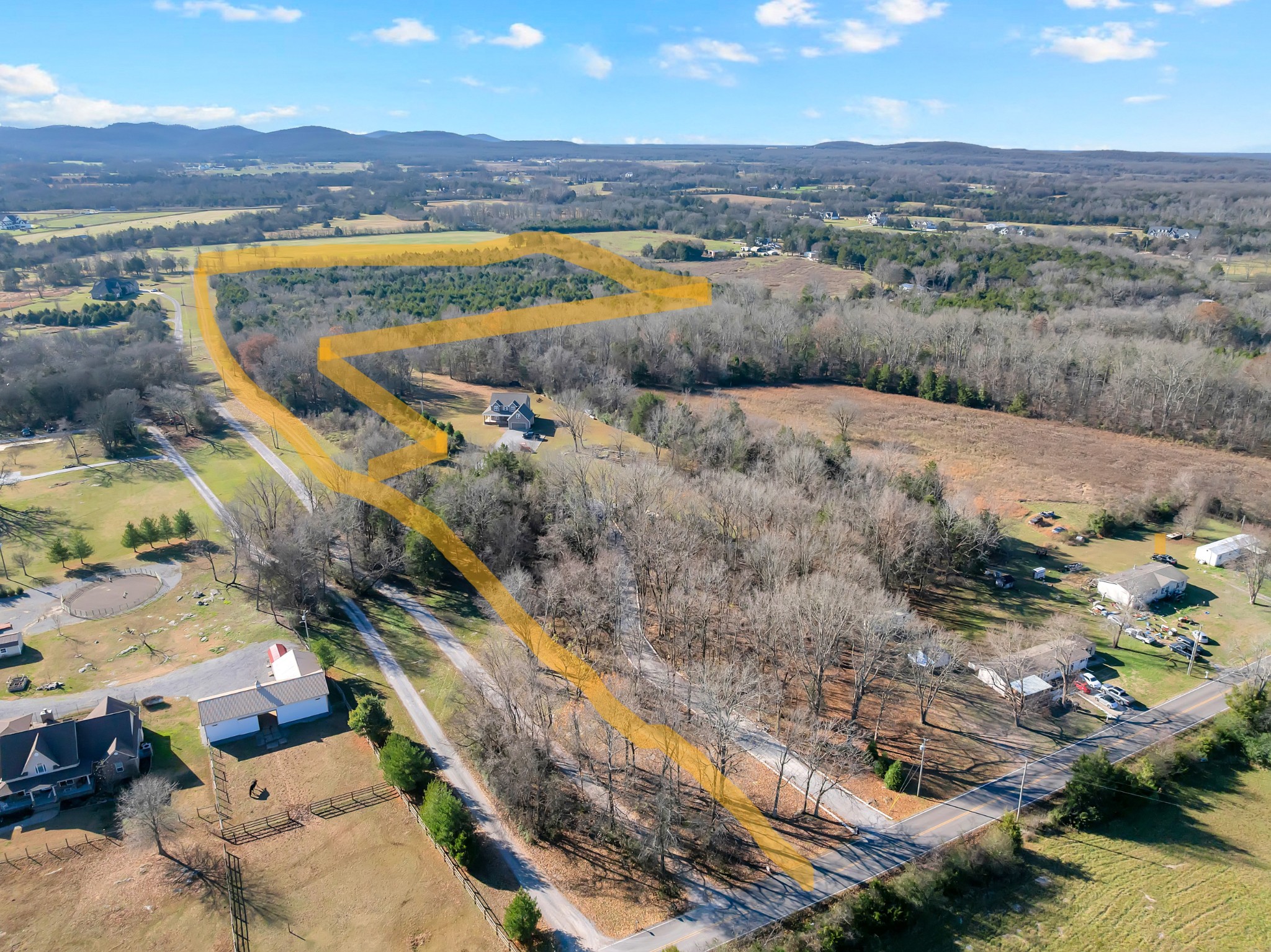 7787 Lowe Road Christiana, TN 37037 - Photo 2 of 15 a view of a lake with mountains in the background