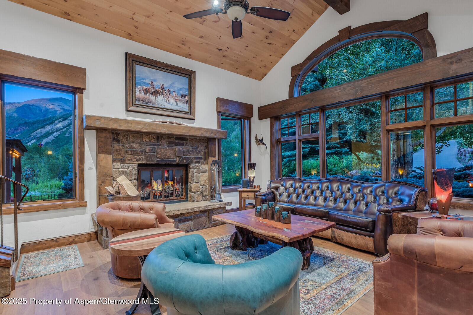 606 Dorais Way Redstone, CO 81623 - Photo 18 of 103 a living room with furniture fireplace and a large window