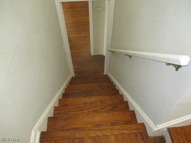 3703 Bainbridge Road Cleveland Heights, OH 44118 - Photo 8 of 16 Stairs with wood finished floors going to 2nd bedroom