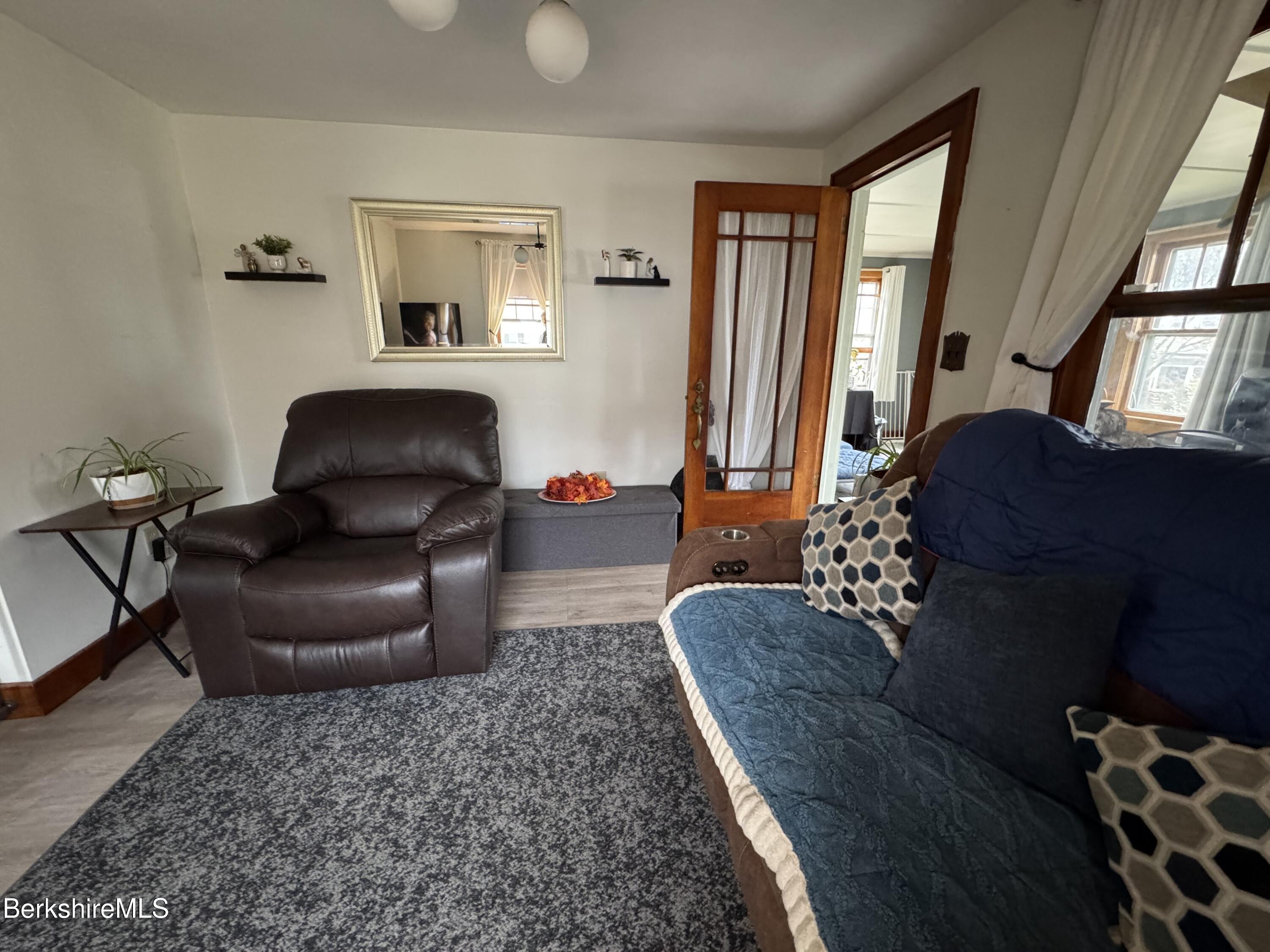 13 Water Street Adams, MA 01220 - Photo 6 of 15 a living room with furniture and a rug