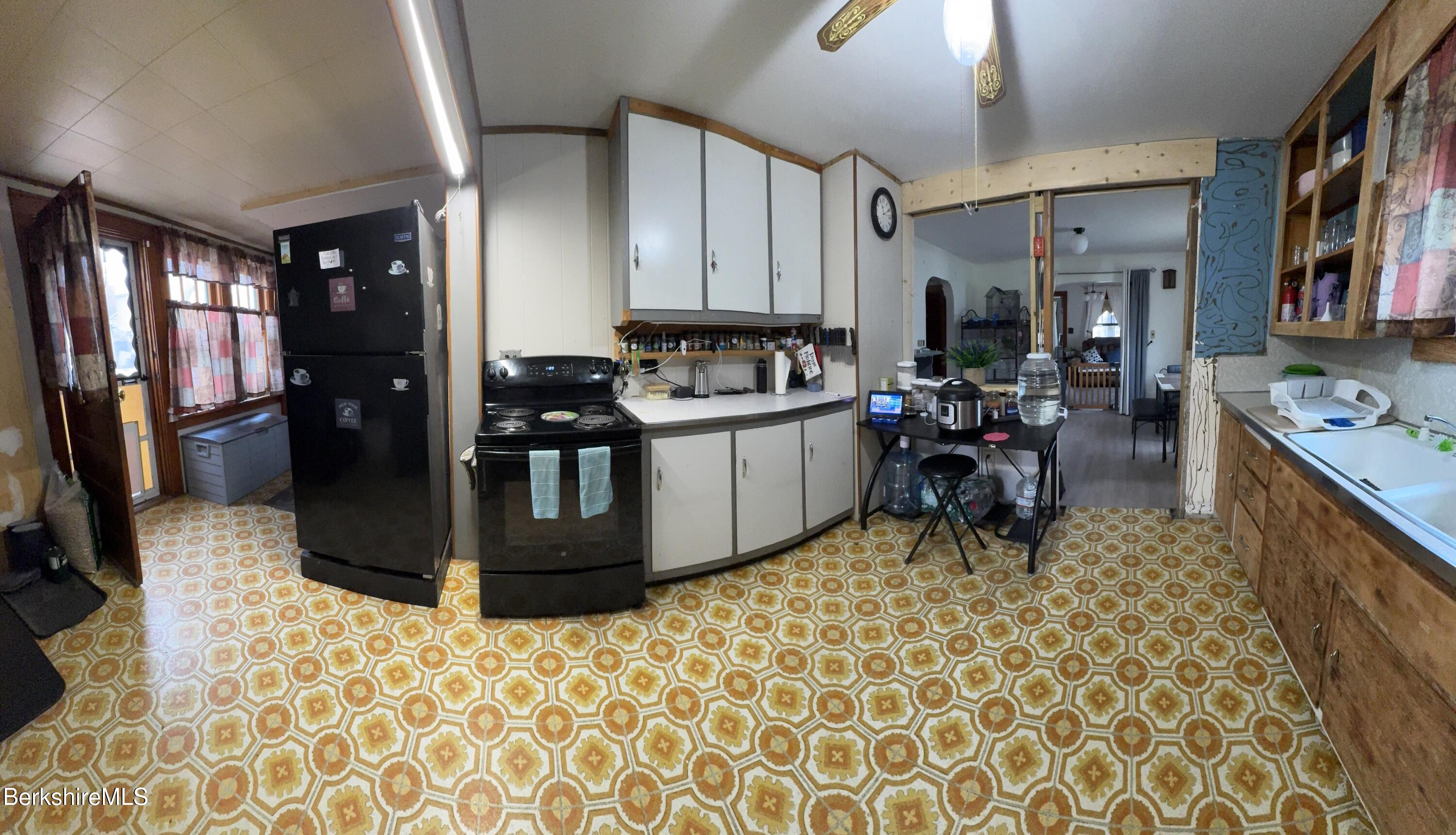 13 Water Street Adams, MA 01220 - Photo 10 of 15 a kitchen with a sink and cabinets