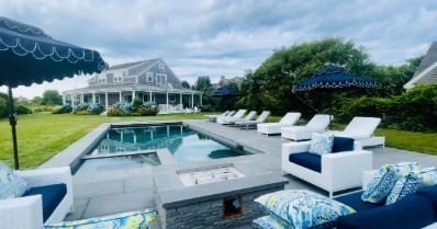 7 Packet Drive Nantucket, MA 02554 - Photo 18 of 38 a view of a house with backyard sitting area and garden