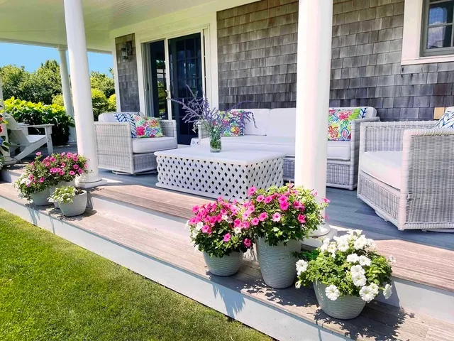 a garden view with a seating space