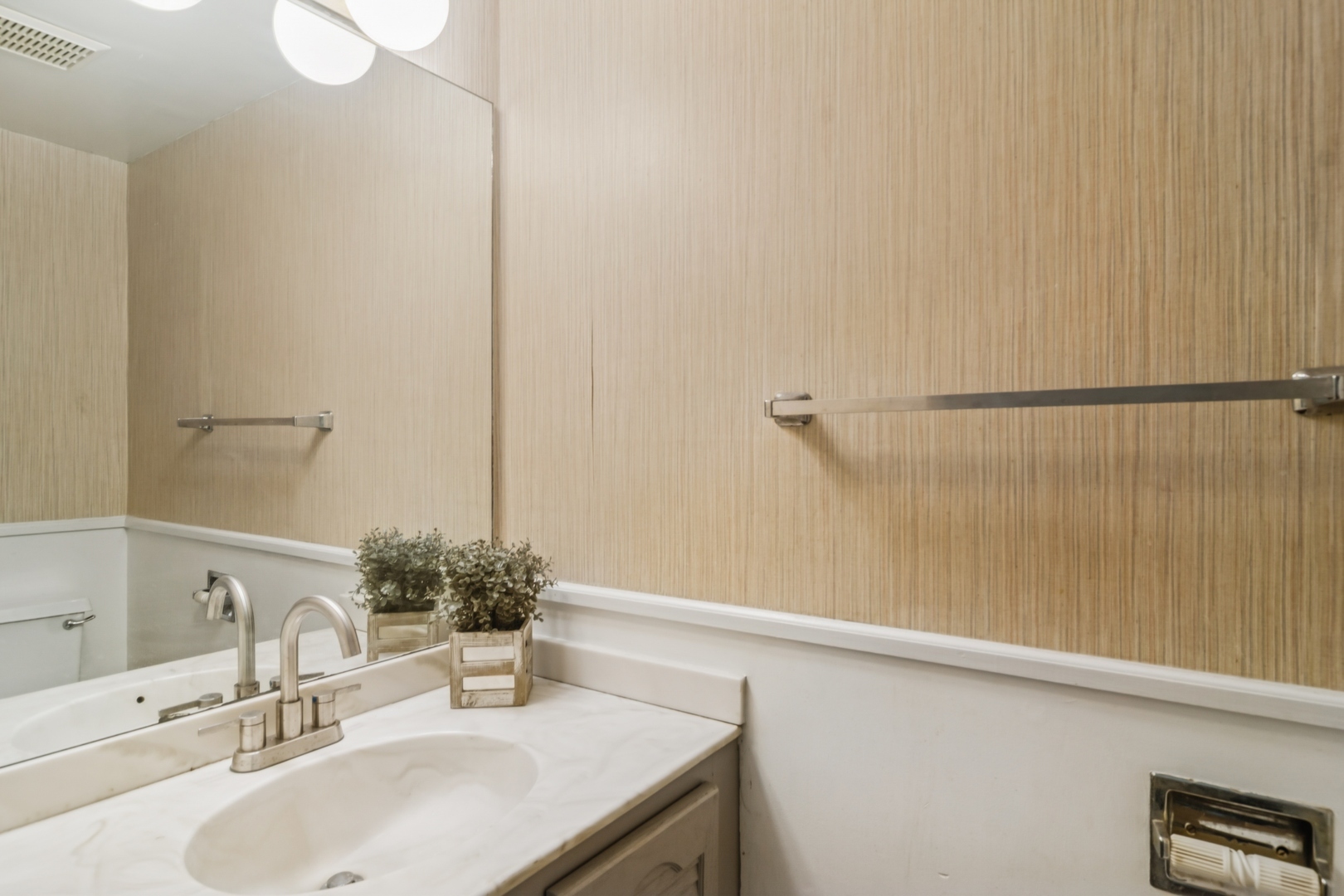 452 Harrison Court Vernon Hills, IL 60061 - Photo 6 of 11 a bathroom with a sink and a mirror