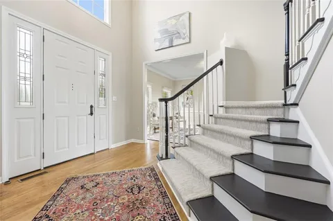a view of staircase with white walls
