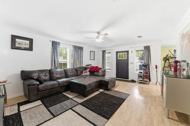 a living room with furniture and a couch
