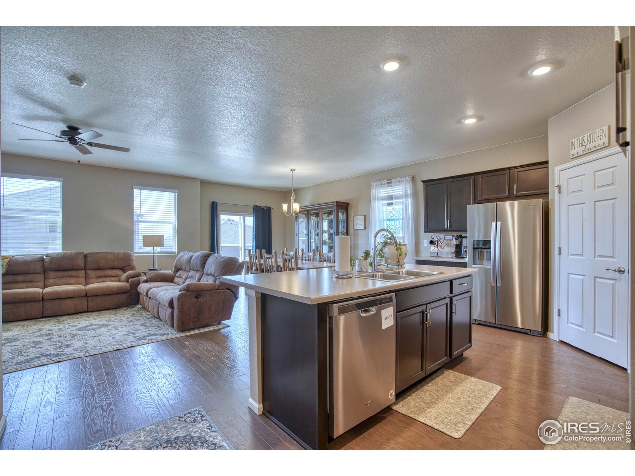 7215 Clarke Drive Frederick, CO 80530 - Photo 4 of 21 Kitchen & Living Room